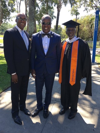Pictured:  Dr. Erhabor Ighodaro (center) with FMU Board of Trustee Members - Pastor Wayne Lomax (left); and Charles George (right).