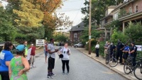 Protesters gather outside of Governor Carney's residence. (Photo: Business Wire)