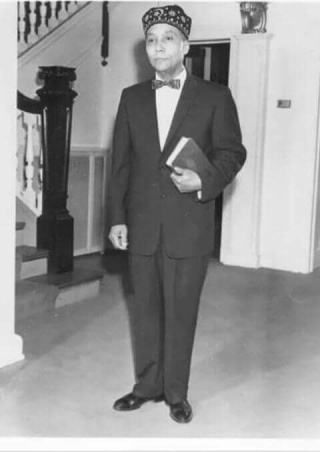Elijah Muhammad in his home at 4847 S. Woodlawn Avenue