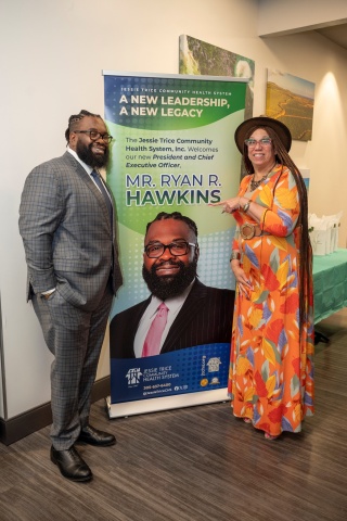 Ryan R. Hawkins, president and CEO of JTCHS with Debra Toomer of WMBM 1490 AM, at the welcoming reception held in his honor at the JTCHS Barbara J. Jordan Community Health and Wellness Center. Photo Credit: Ricardo Reyes, Sonshine Communications