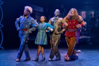 Eliah Ahmad Lewis, Dana Cimone as Dorothy, D. Jerome as The Tinman, and Cal Mitchell as The Lion in the North American Tour of THE WIZ. Photo by Jeremy Daniel