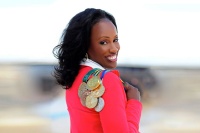 Jackie Joyner-Kersee with her Olympic medals — three gold, one silver and two bronze. Courtesy of Jackie Joyner-Kersee Foundation